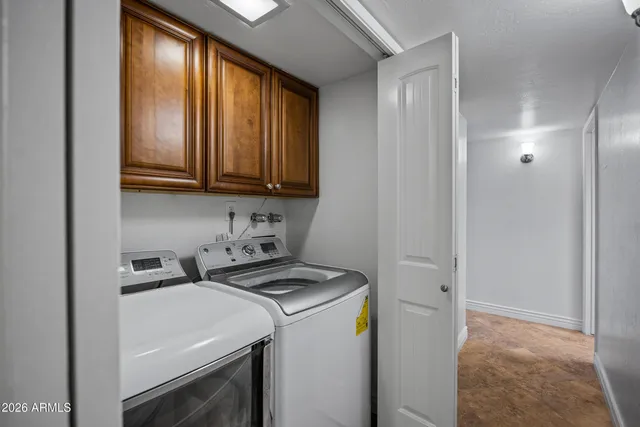 a bathroom with a sink double vanity and a mirror