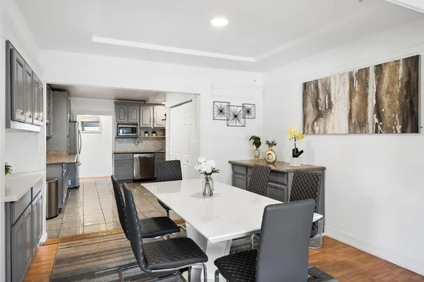 a view of a dining room with furniture