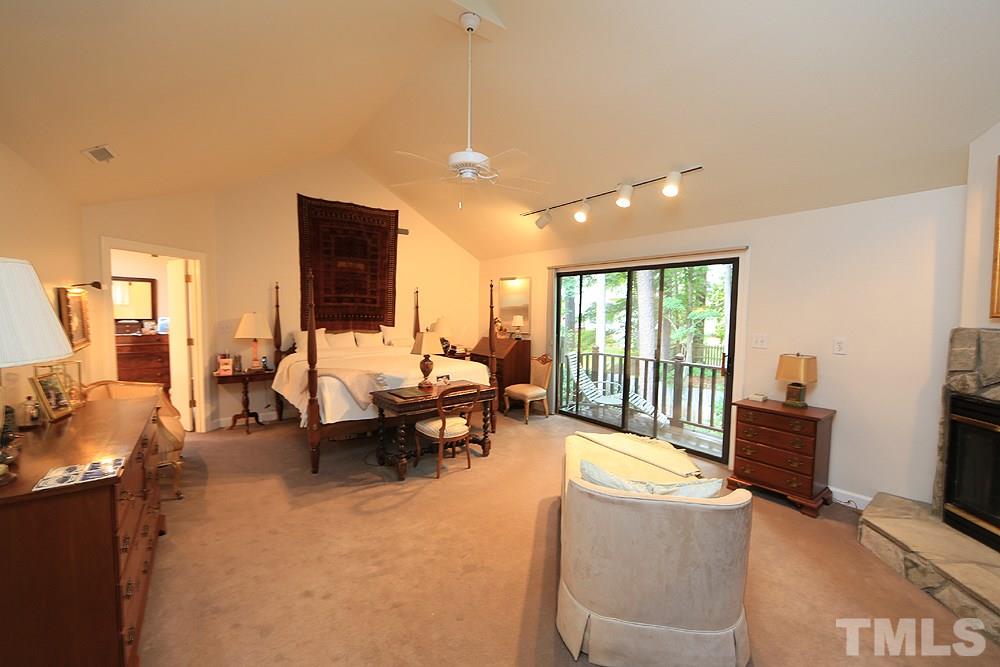 1504 Pecore Place Raleigh, NC 27615 - Photo 11 of 25 Very large master suite with its own balcony and fireplace.