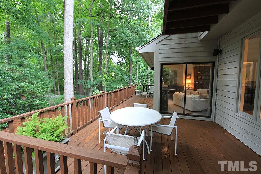 1504 Pecore Place Raleigh, NC 27615 - Photo 21 of 25 Large back deck that can be accessed from the living room and family room.