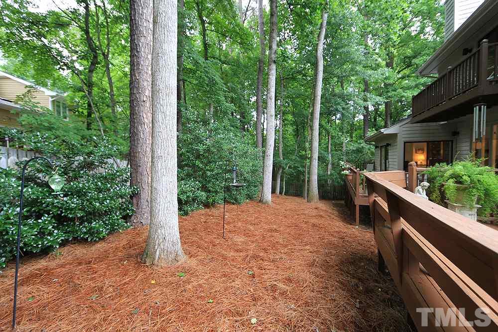 1504 Pecore Place Raleigh, NC 27615 - Photo 22 of 25 This yard has been extremely well taken care of. Also be sure to notice the fence that goes around as well as a beautiful iron gate.