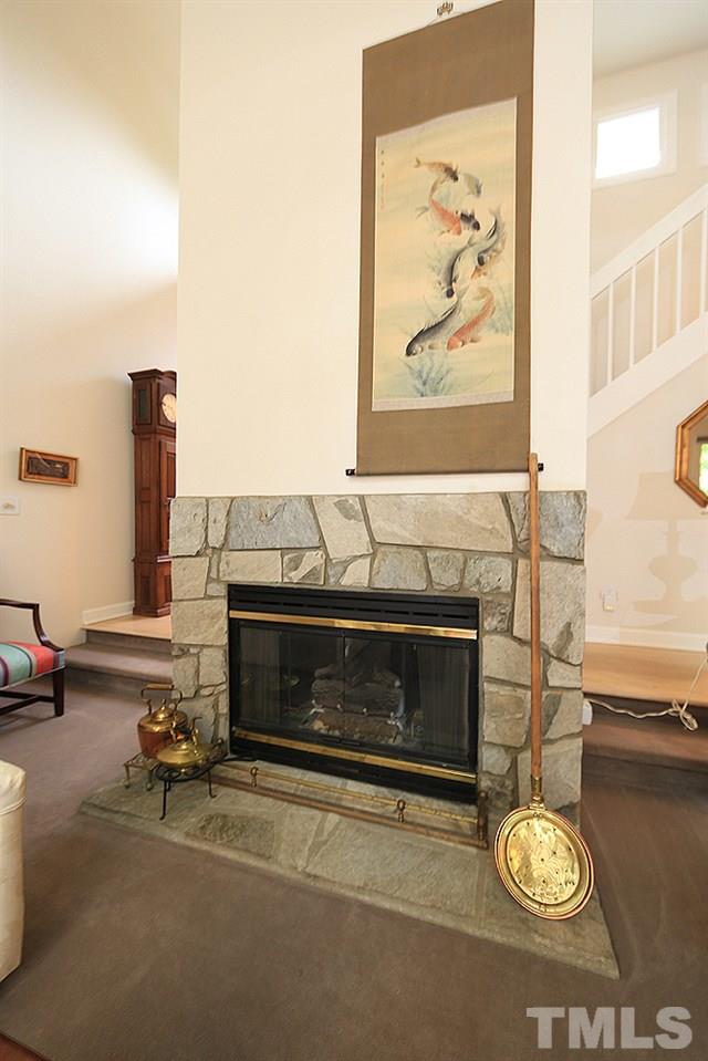 1504 Pecore Place Raleigh, NC 27615 - Photo 5 of 25 1 of 3 fireplaces with gas logs in this home.