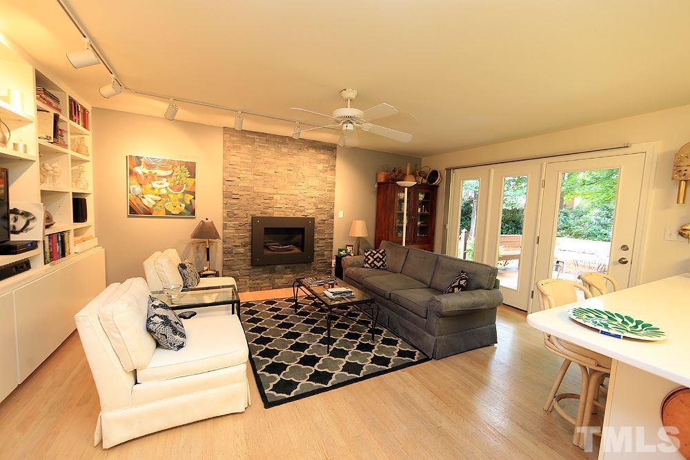1504 Pecore Place Raleigh, NC 27615 - Photo 10 of 25 This family room is perfectly open to the kitchen for all to enjoy time together.