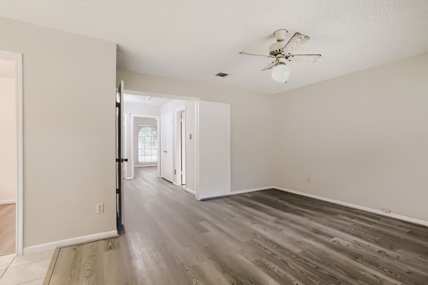 10103 Inwood Shadows Street Houston, TX 77088 - Photo 17 of 32 a view of a room with wooden floor