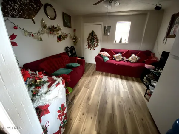 a bed room with a bed and a chandelier