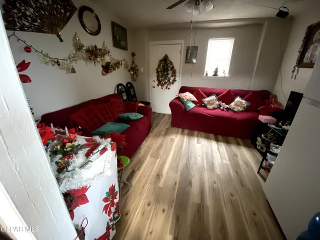 a bed room with a bed and a chandelier