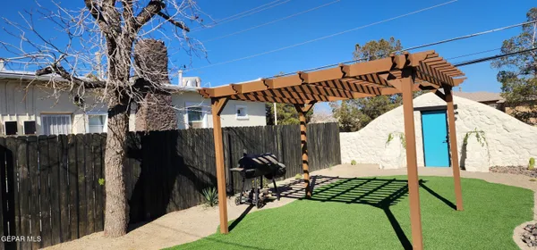 a view of a back yard of the house