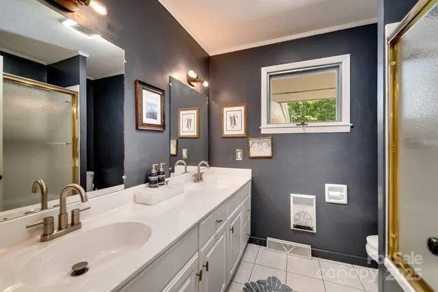 a bedroom with a bed and a chair