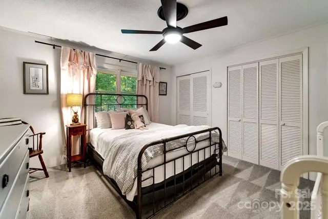 a living room with furniture and windows