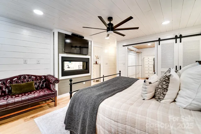 a room with furniture and a book shelf