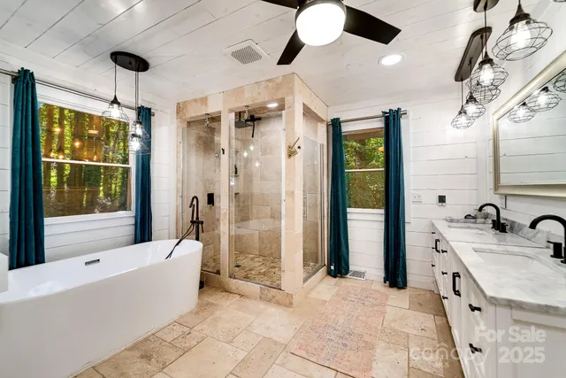 a bathroom with a double vanity sink and a mirror