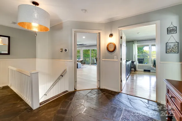 a view of a living room and bathroom