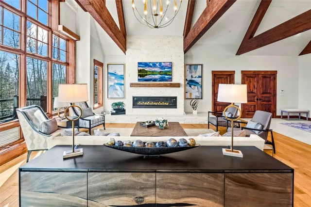 a living room with furniture and a table