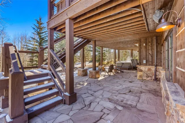 a view of a backyard with sitting area and furniture