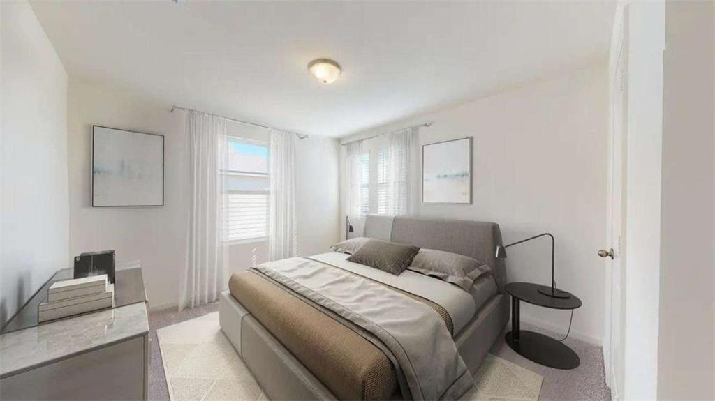 494 Otway Loop Winder, GA 30680 - Photo 11 of 17 a bedroom with a bed and a window