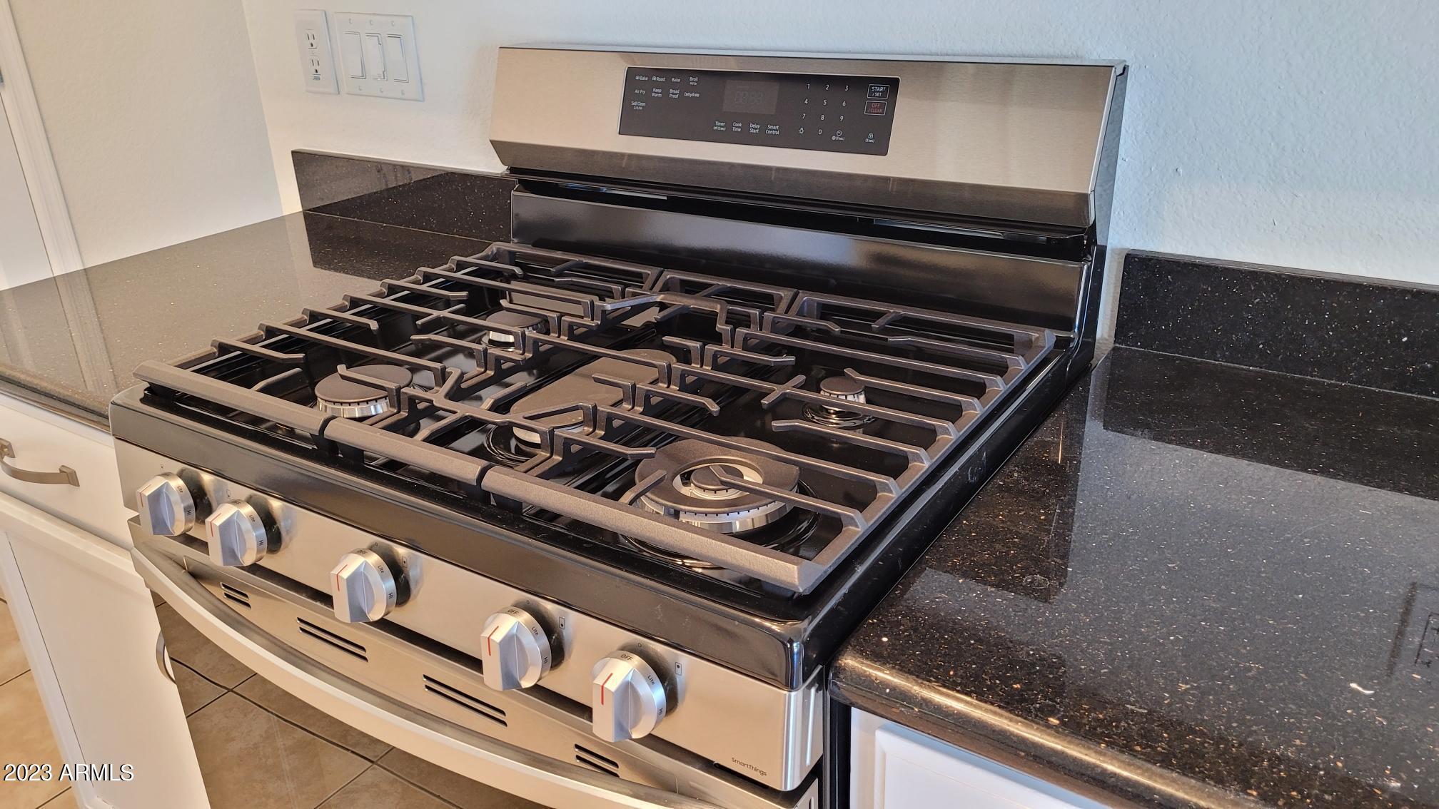 1821 East Apollo Road Phoenix, AZ 85042 - Photo 15 of 47 NEW 5-BURNER GAS STOVE