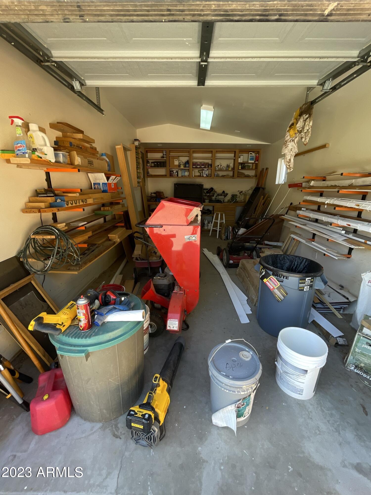 1821 East Apollo Road Phoenix, AZ 85042 - Photo 42 of 47 WORKSHOP WITH GARAGE DOOR