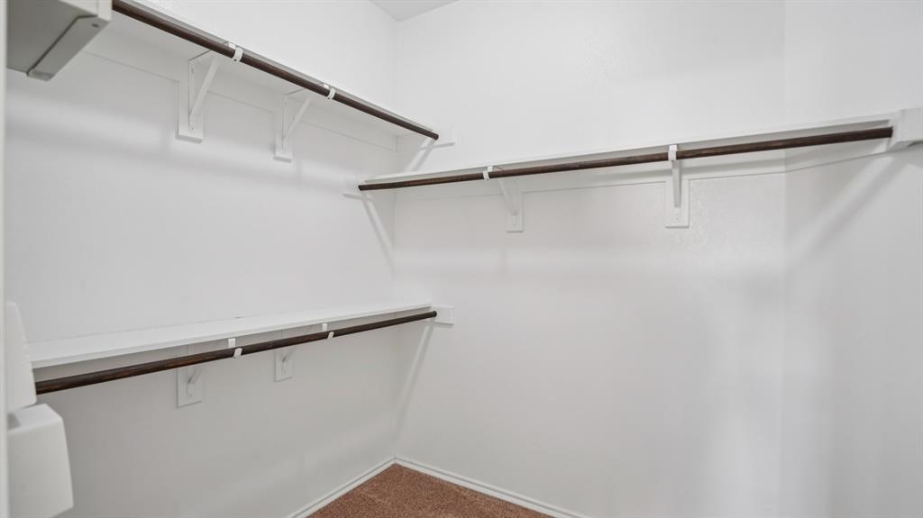 9904 Copperhead Lane McKinney, TX 75071 - Photo 24 of 40 Spacious closet with dark carpet
