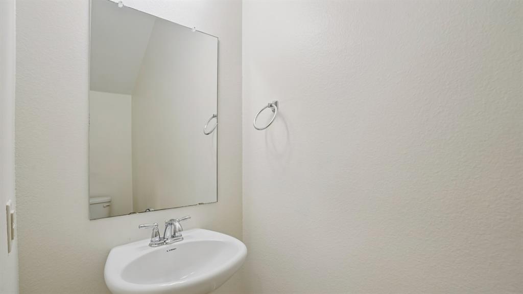 9904 Copperhead Lane McKinney, TX 75071 - Photo 26 of 40 Bathroom featuring a sink