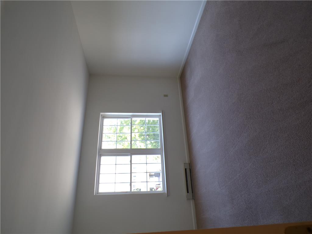3283 Seip Road Macungie, PA 18062 - Photo 22 of 33 Bedroom #2 window bathes this room in natural light, complemented by plush carpeting and clean walls.