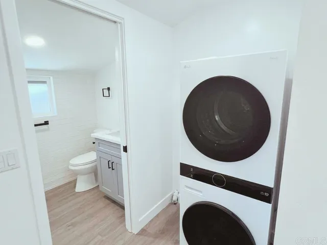 a bathroom with a toilet and a sink