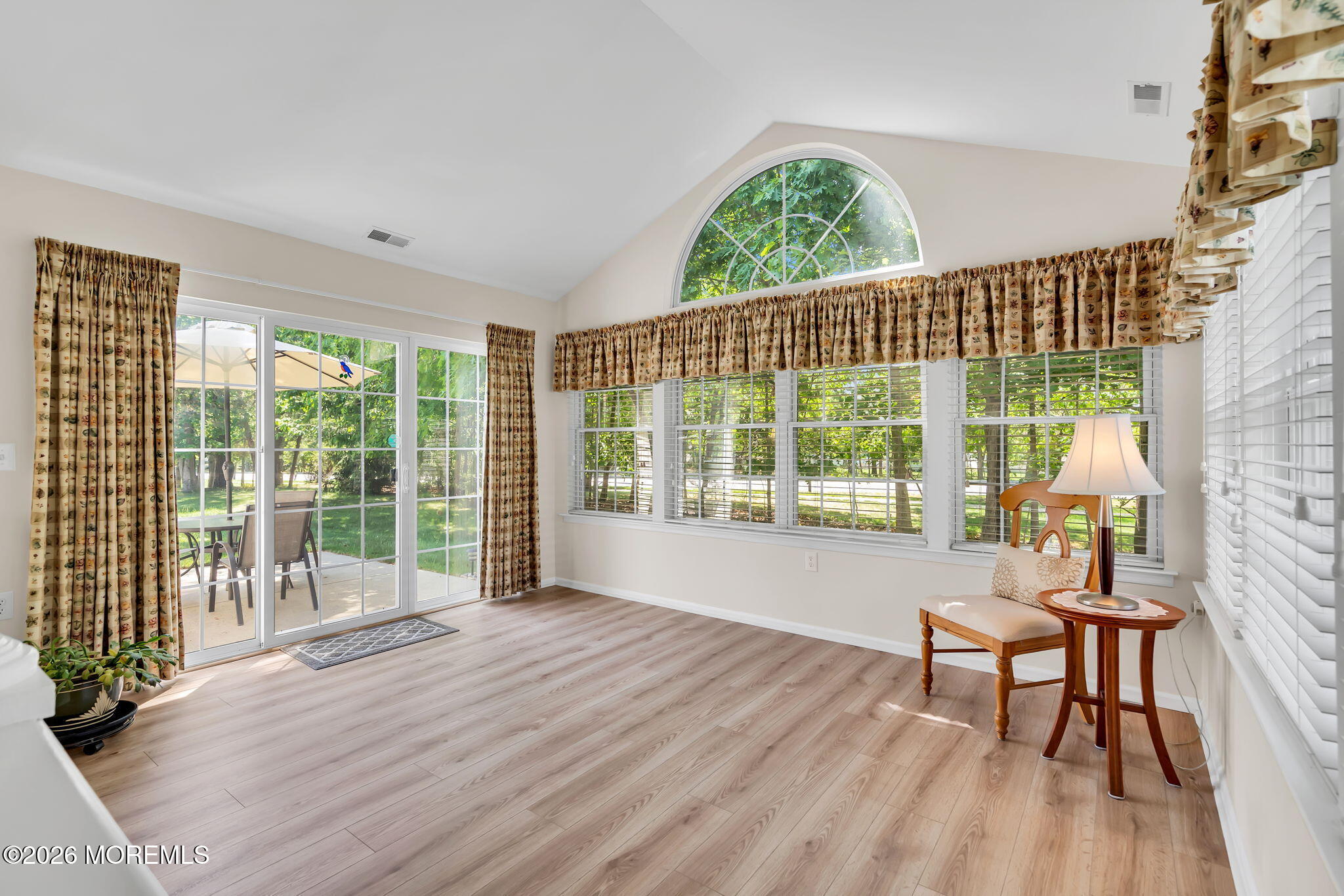 10 Congressional Road Jackson, NJ 08527 - Photo 32 of 72 a view of a room with wooden floor and chairs