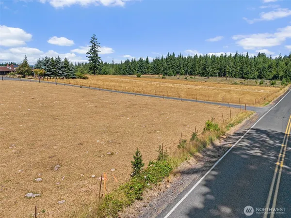 a view of an ocean and city