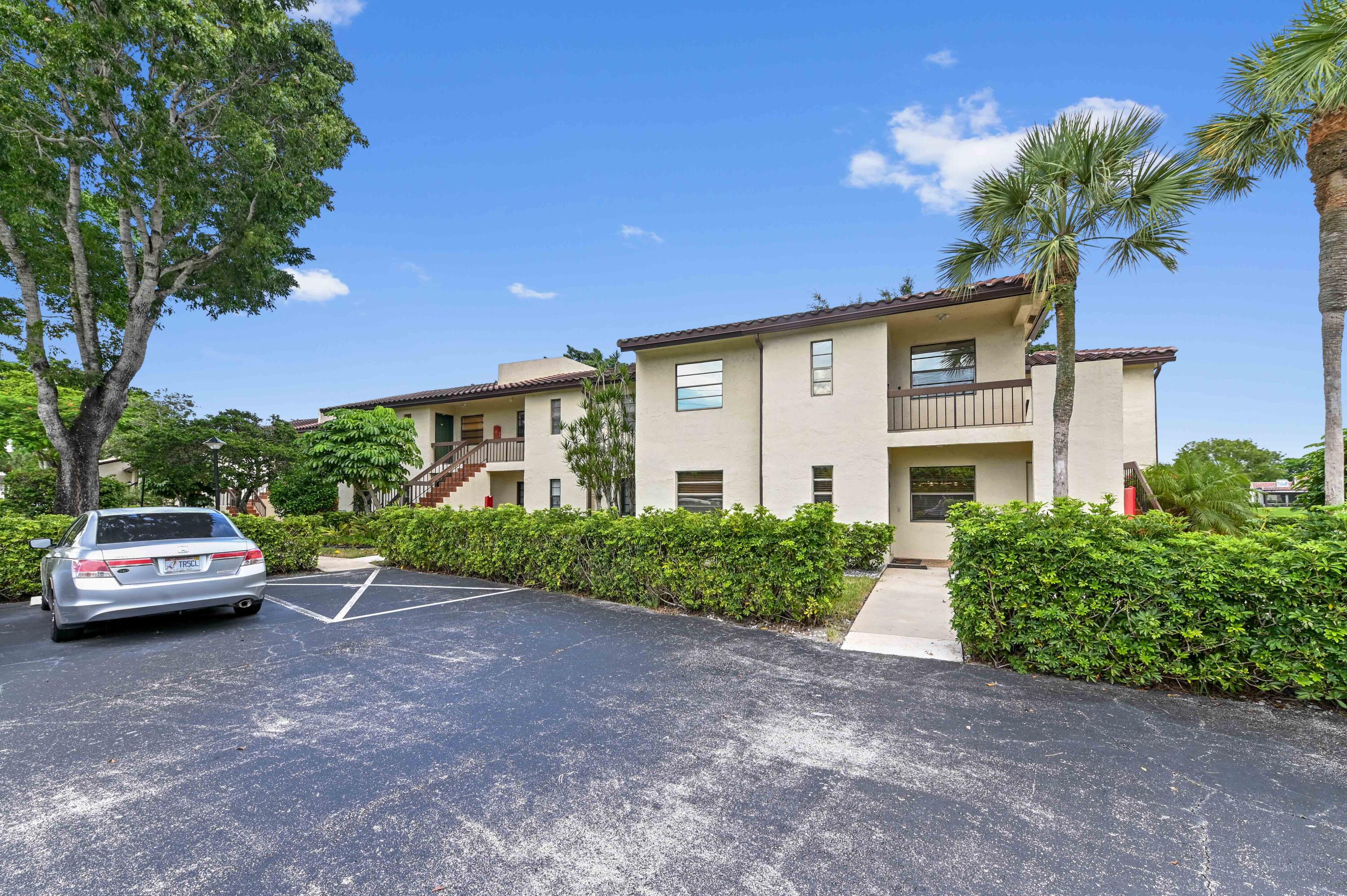 21827 Arriba Real, Unit 11K Boca Raton, FL 33433 - Photo 1 of 32 01 Front 01