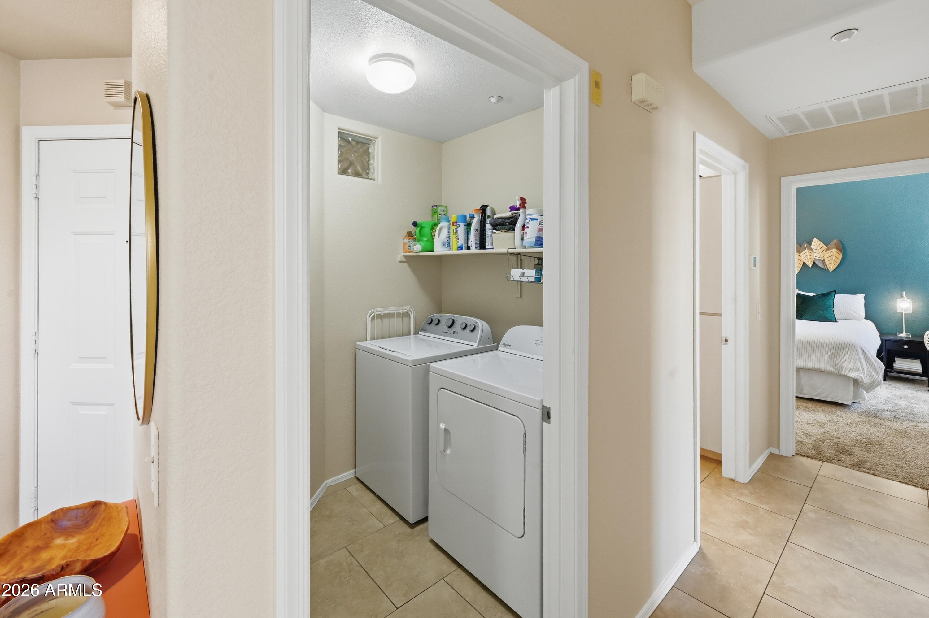 5303 North 7th Street, Unit 220 Phoenix, AZ 85014 - Photo 24 of 33 a room with a washer and dryer