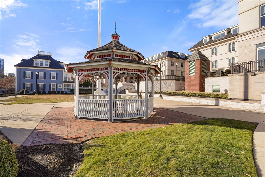 65 Chelsea Street, Unit 305 Boston, MA 02129 - Photo 26 of 30 a front view of a house with a yard