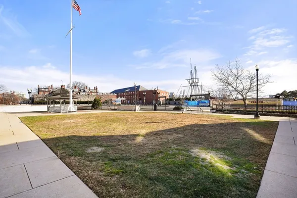 a view of lake with yard