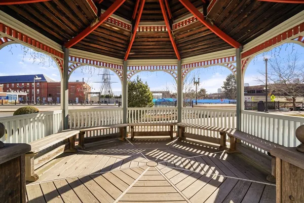 a view of a balcony with furniture