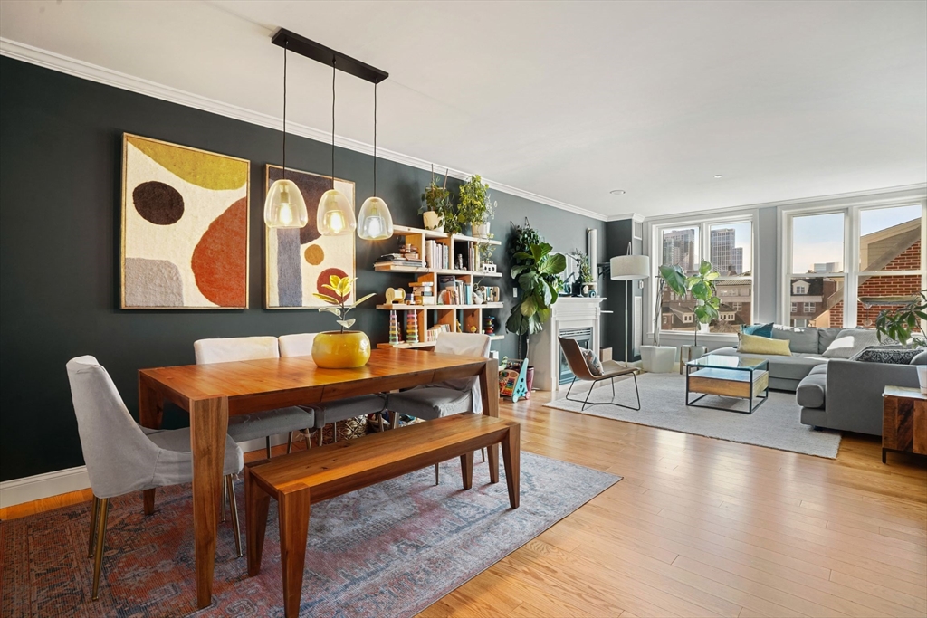 65 Chelsea Street, Unit 305 Boston, MA 02129 - Photo 7 of 30 a living room with furniture and wooden floor