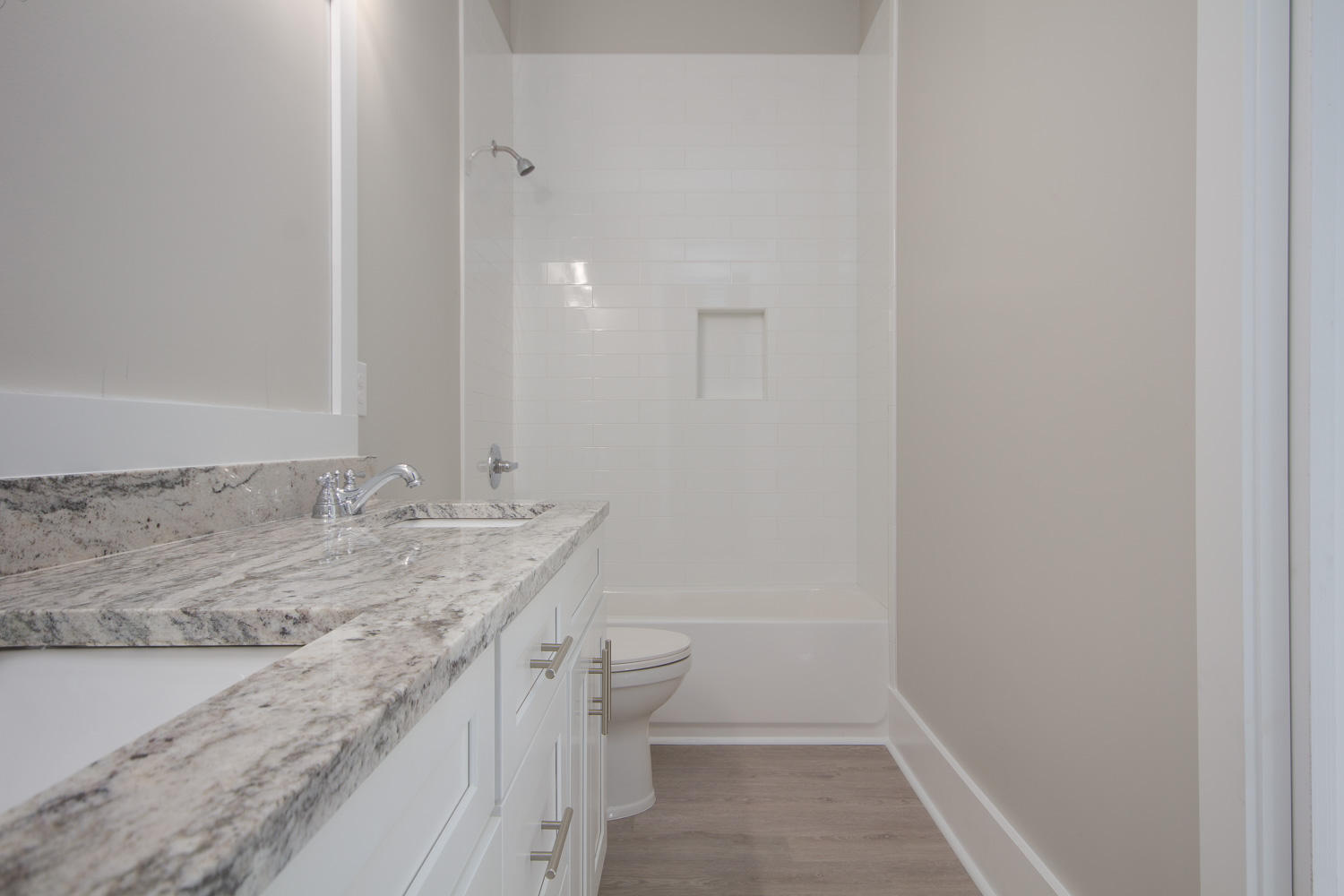 196 Matt's Way Santa Rosa Beach, FL 32459 - Photo 16 of 26 a bathroom with a granite countertop sink and a mirror