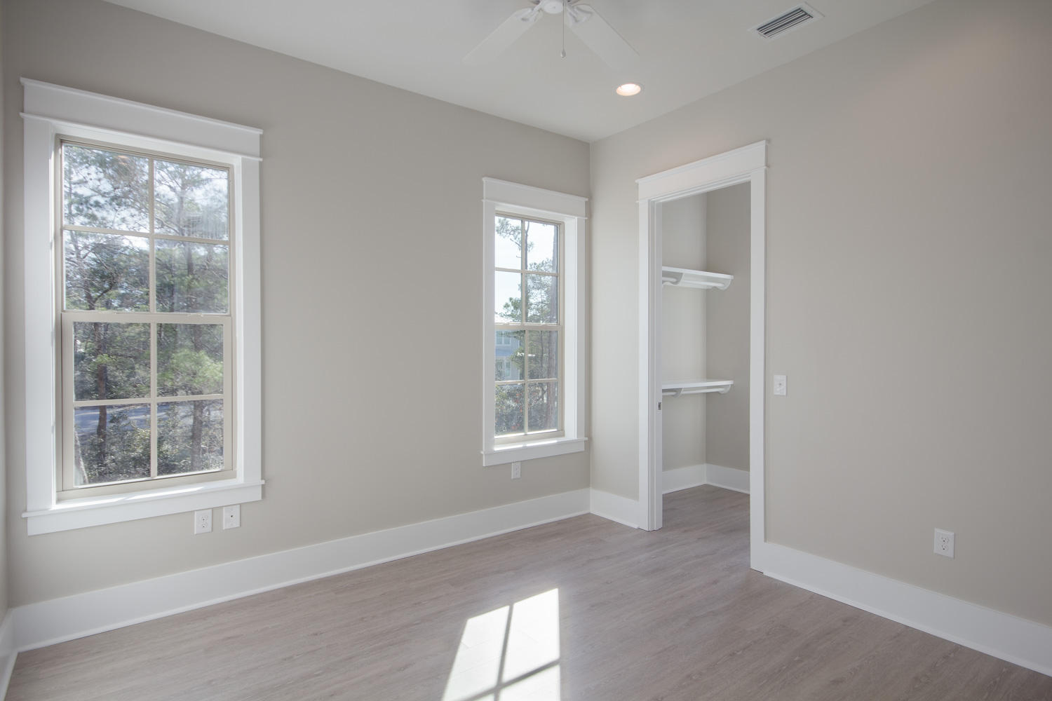 196 Matt's Way Santa Rosa Beach, FL 32459 - Photo 17 of 26 an empty room with windows and closet
