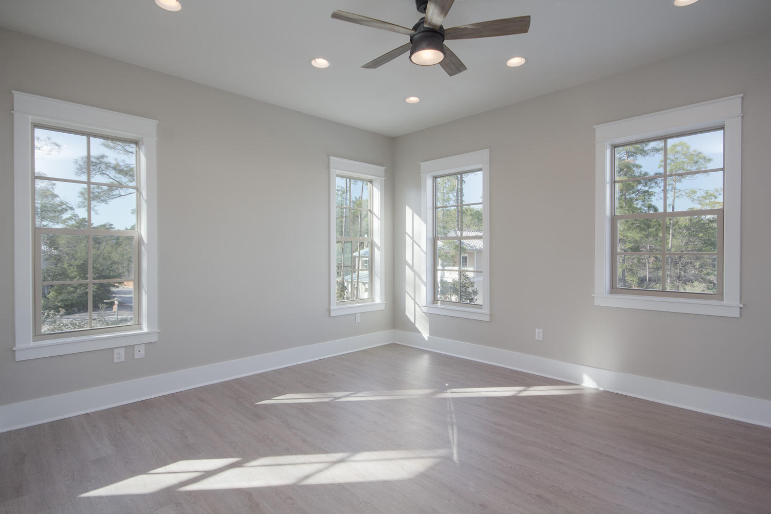 196 Matt's Way Santa Rosa Beach, FL 32459 - Photo 18 of 26 a view of an empty room with a window and wooden floor