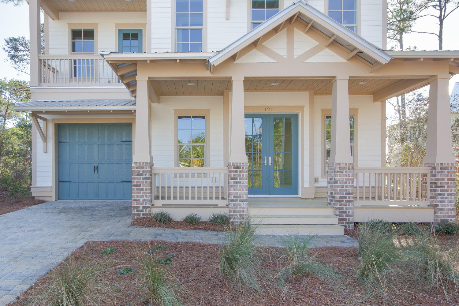 196 Matt's Way Santa Rosa Beach, FL 32459 - Photo 2 of 26 a front view of a house with a porch