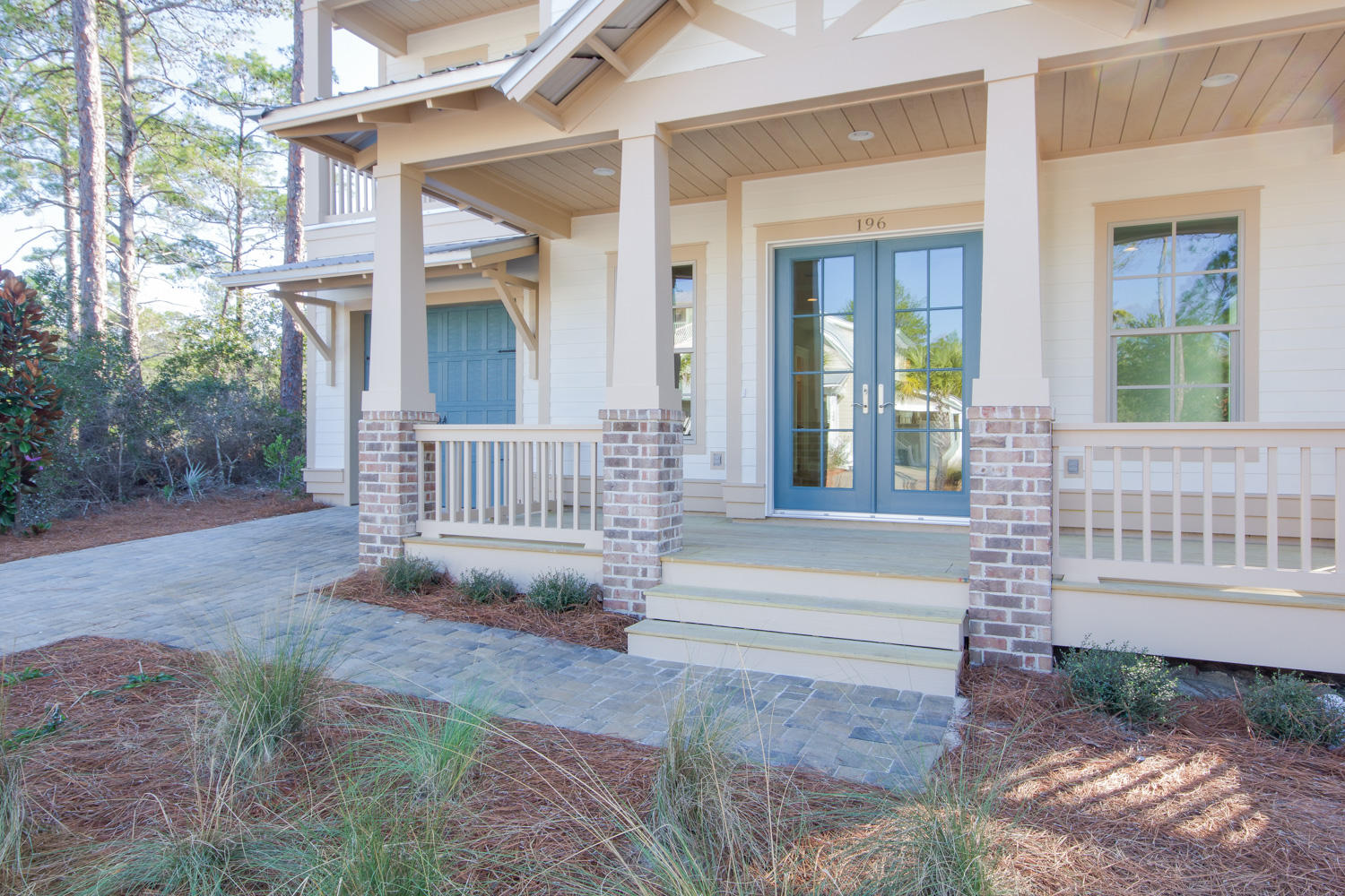 196 Matt's Way Santa Rosa Beach, FL 32459 - Photo 3 of 26 a front view of a house with a yard