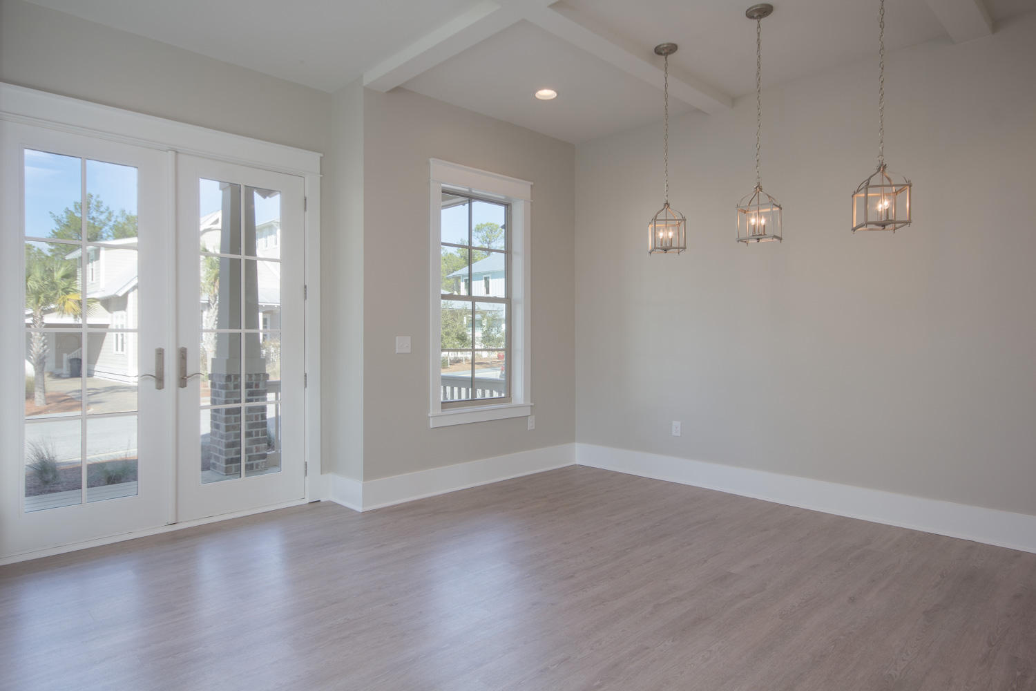 196 Matt's Way Santa Rosa Beach, FL 32459 - Photo 5 of 26 wooden floor in an empty room with a window