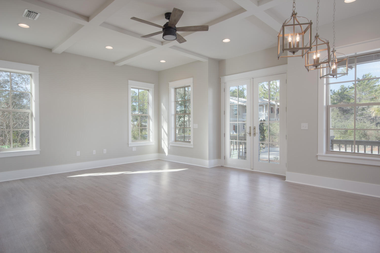 196 Matt's Way Santa Rosa Beach, FL 32459 - Photo 6 of 26 a view of an empty room with wooden floor and a window