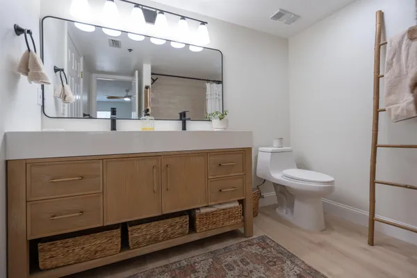 a bathroom with a tub and shower