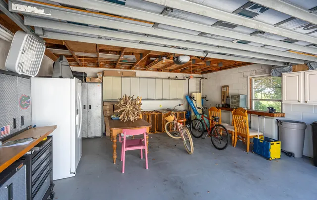 a view of a garden with a building in the background