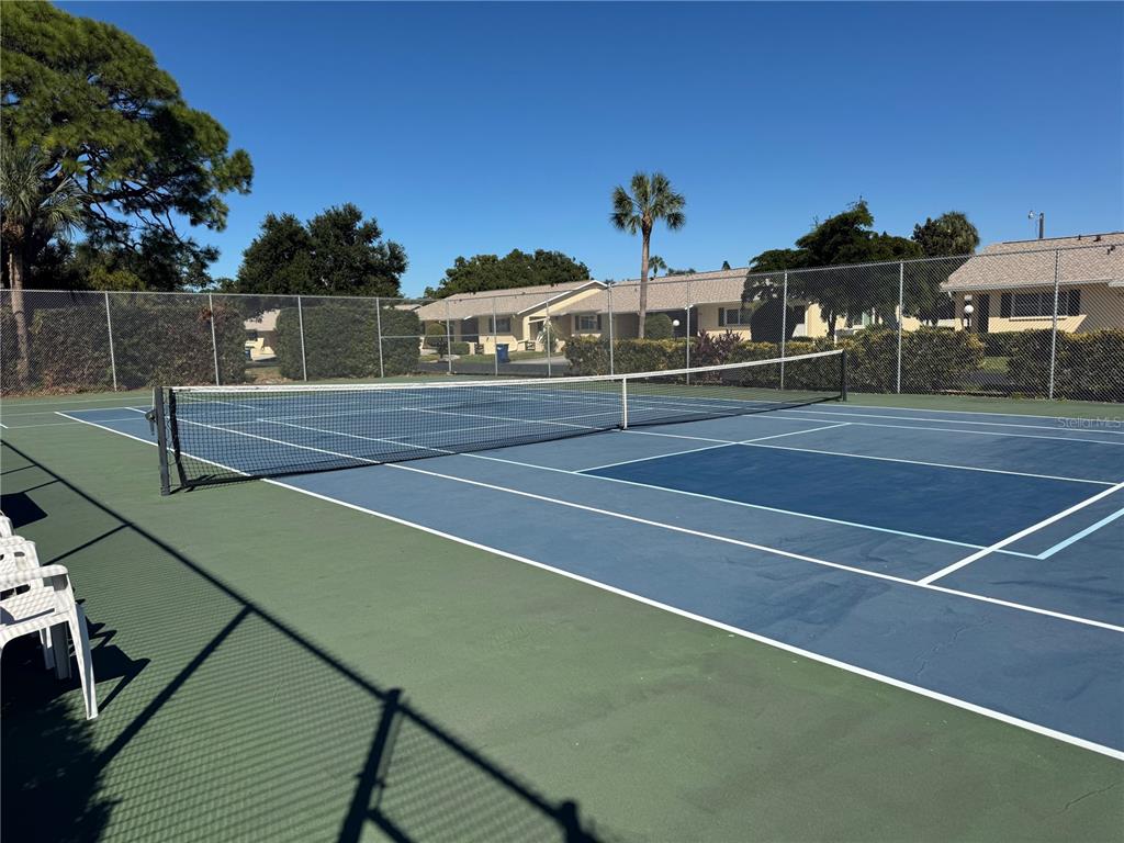 315 30th Avenue West, Unit 101B Bradenton, FL 34205 - Photo 20 of 20 a view of a tennis court