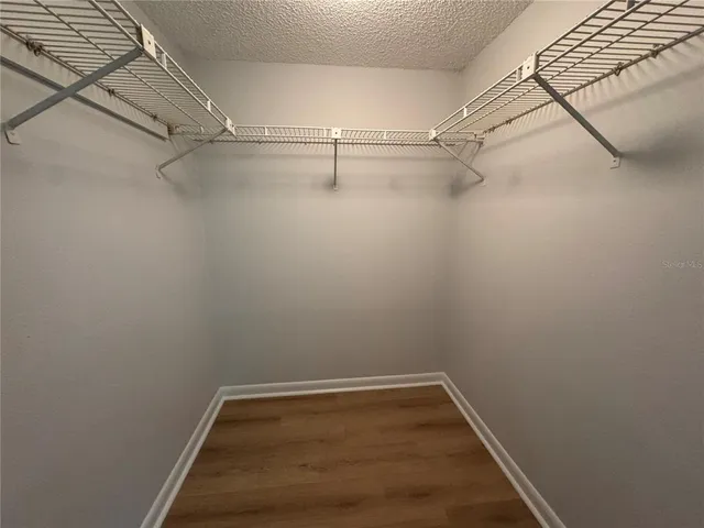 a view of a room with racks on the wall