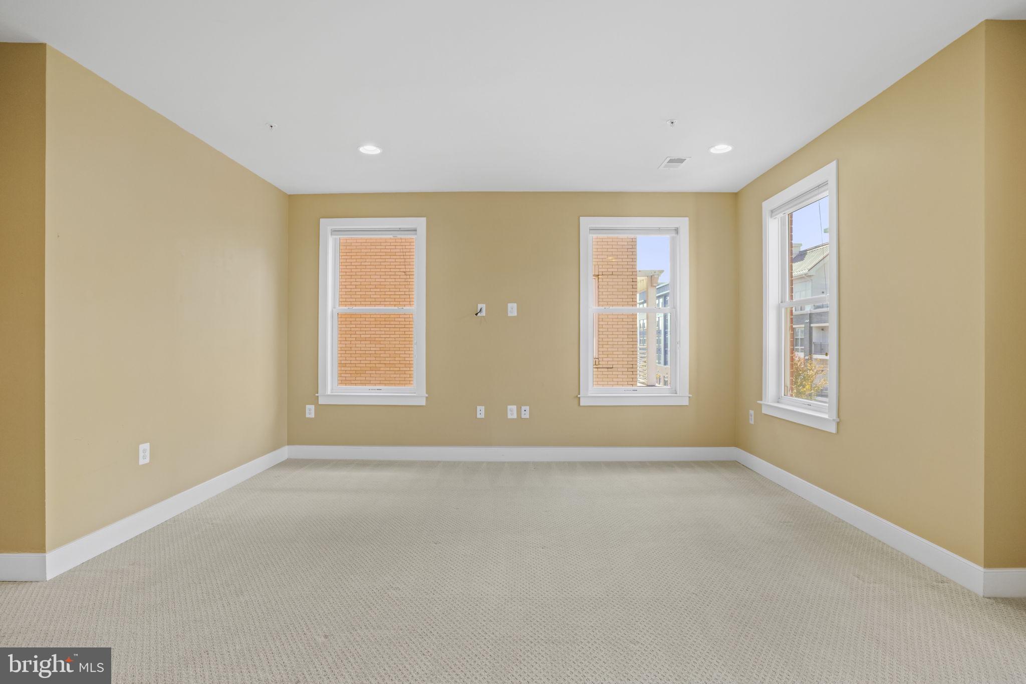 1901 Main Line Boulevard, Unit 102 Alexandria, VA 22301 - Photo 15 of 34 a view of an empty room with a window
