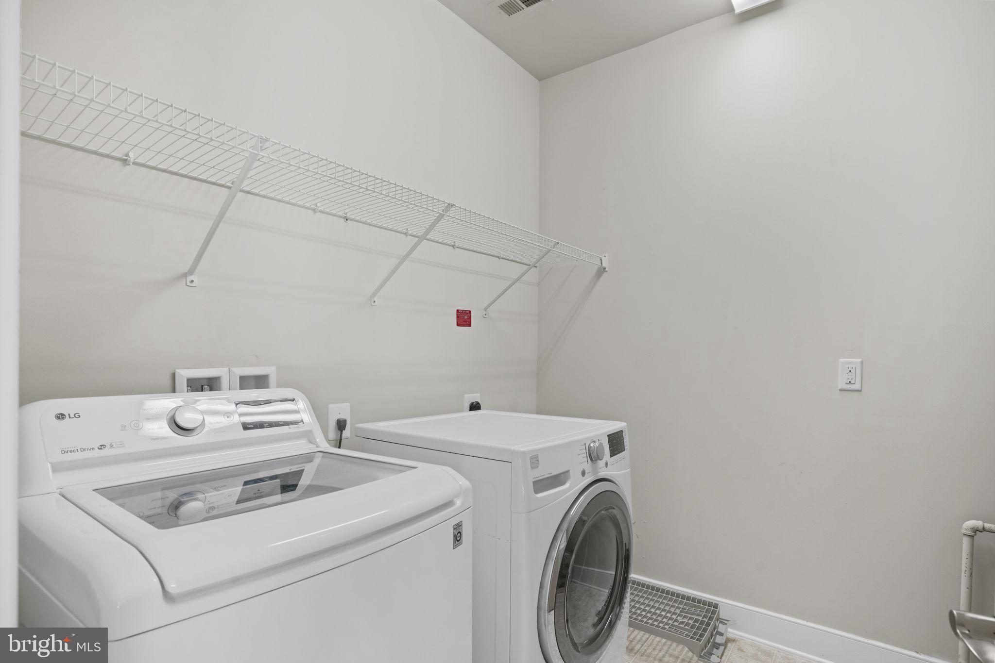 1901 Main Line Boulevard, Unit 102 Alexandria, VA 22301 - Photo 20 of 34 a utility room with dryer and washer