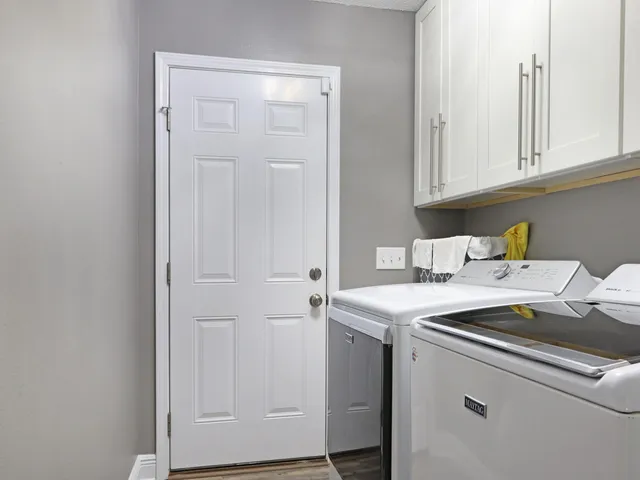 a kitchen with stainless steel appliances a refrigerator stove and sink