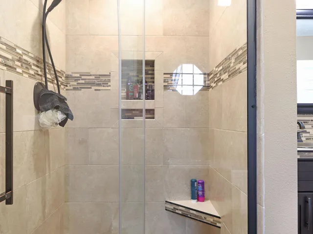 a view of a house with a yard porch and sitting area