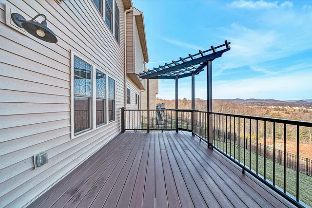 a view of balcony with a potted plant