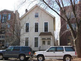 a car parked in front of a house
